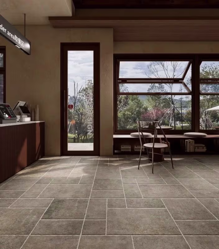 A warm limestone interior with pale floors and garden views