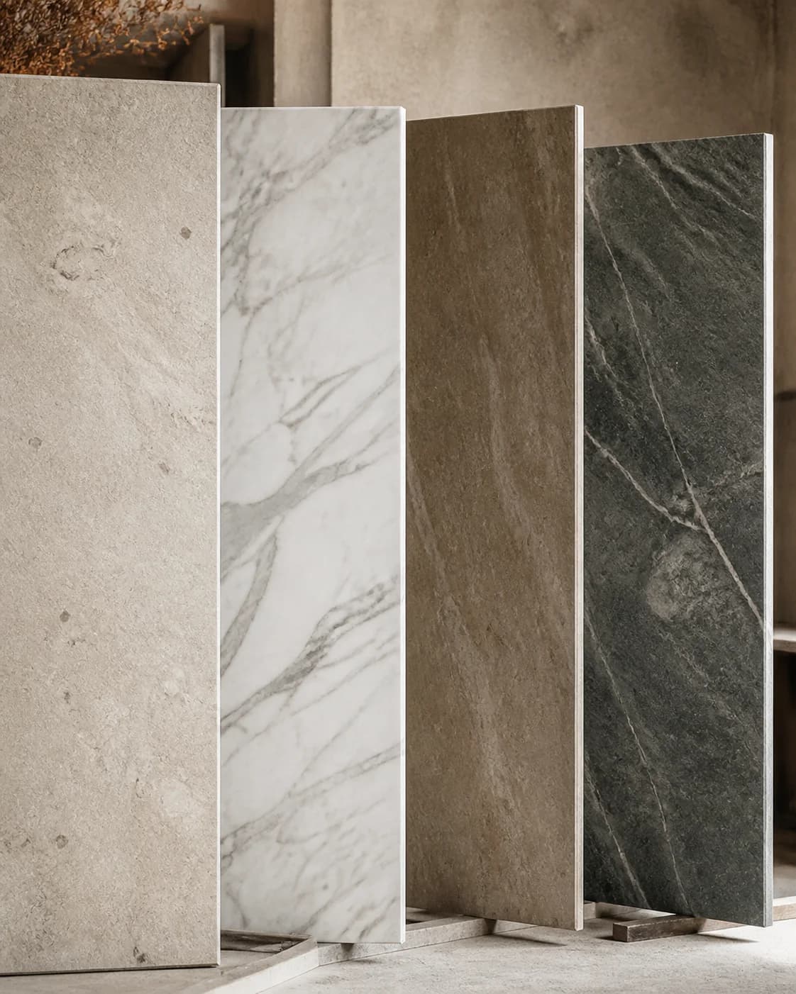 A selection of natural stone slabs showing varied colour and texture